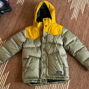 Patagonia Kids' Hi-Loft Down Sweater™ Hoody, sage green and mustard yellow.